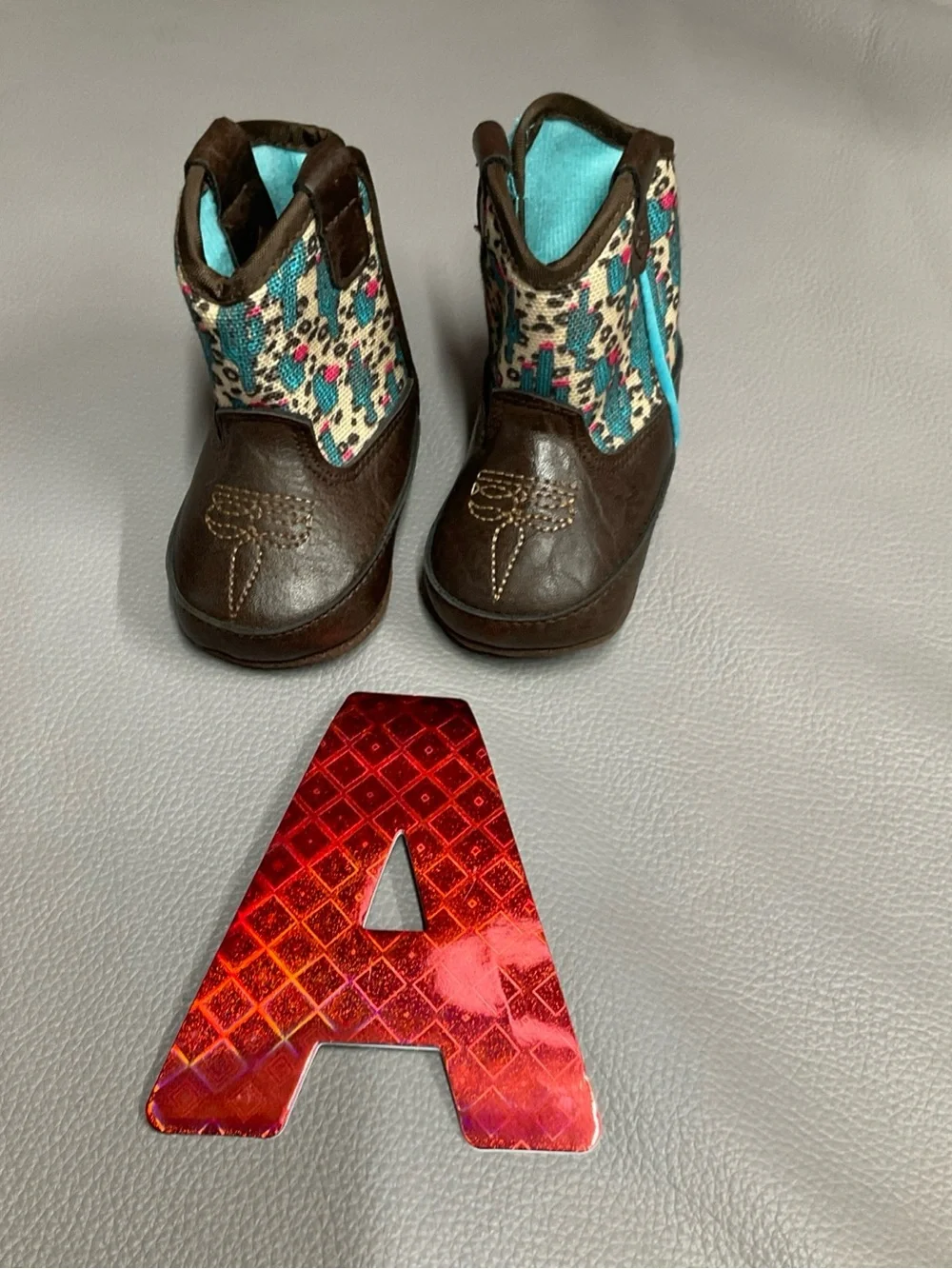 Ariat Brown Kids Boot with Turquoise and Pink Pattern